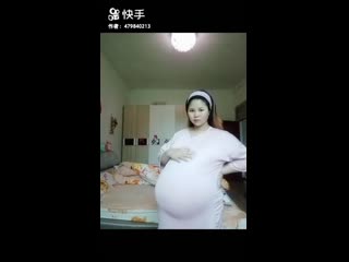 gigantic asian pregnant belly