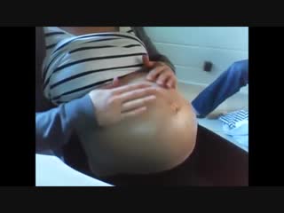 belly pregnant wacthing her