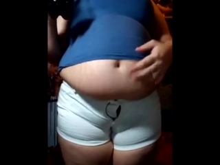 measuring a bbw belly in tight white jeans