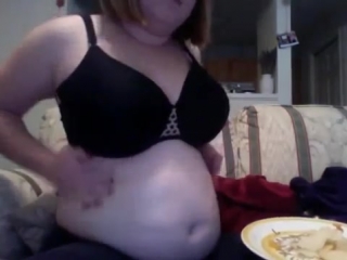 fat girl stuffs herself with many sandwiches - more on stufferdb.com